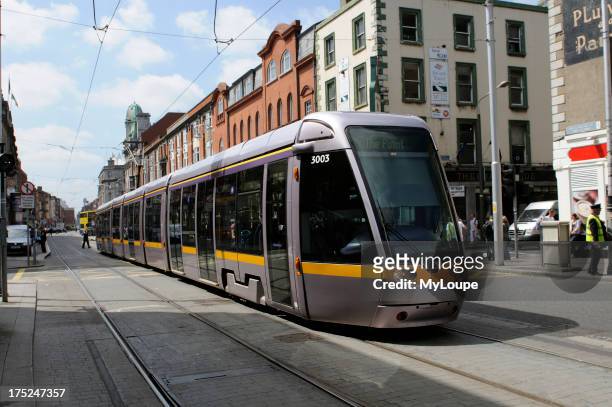 Tram on Abbey Street Dublin Ireland travelling towards The Point