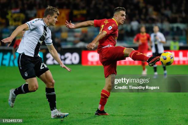 Nikola Krstovic of Lecce and Jaka Bijol of Udinese during the Serie A TIM match between Udinese Calcio and US Lecce at Bluenergy Stadium on October...