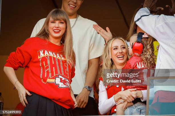 Taylor Swift and Brittany Mahomes react during a game between the Los Angeles Chargers and Kansas City Chiefs at GEHA Field at Arrowhead Stadium on...