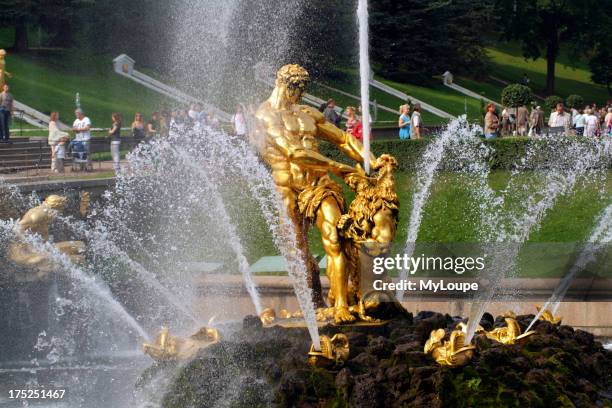 Peterhof Fountains. Russian Gold Gilded Bronze Statue of Samson fighting a lion situated in the Grand Cascade at Peterhof near St Petersburg Russia