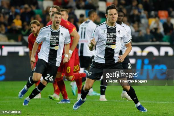 Florian Thauvin of Udinese celebrates scoring a goal from the penalty spot during the Serie A TIM match between Udinese Calcio and US Lecce at...