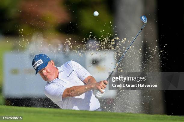 Jeff Maggert plays out of a bunker on the 12th hole during the final round of the Dominion Energy Charity Classic at The Country Club of Virginia on...