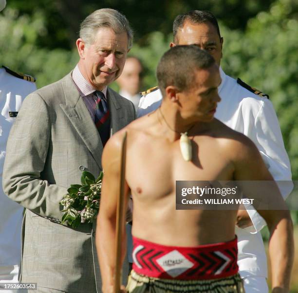 Britain's Prince Charles keeps a close eye on a Maori warrior during a traditional challenge at a welcome to Government House in Wellington, 07 March...