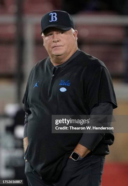 Head coach Chip Kelly of the UCLA Bruins looks on while his team warms up prior to the start of the game against the Stanford Cardinal at Stanford...