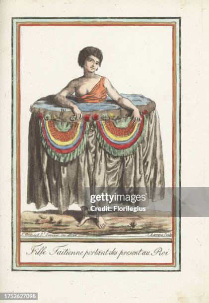 Young Tahitian woman presenting gifts of tapa cloth and breast plates to the king. She wears a large hooped gown laden down with heavy fabric. After...