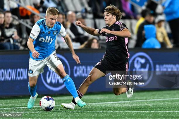 Jere Uronen of Charlotte FC and Benjamin Cremaschi of Inter Miami compete for the ball during the secnod half of their match at Bank of America...