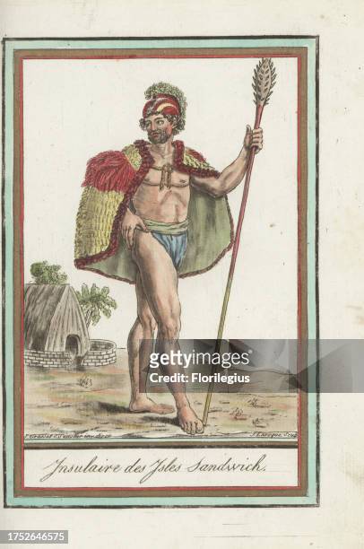 Chief of the Sandwich Isles, now Hawaii. In feather helmet or mahiole, feather cloak or ahu'ula, and loincloth, holding a mace embedded with shark...
