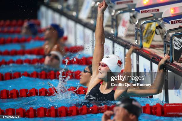 Zige Liu of China celebrates after winning the Swimming Women's Butterfly 200m Final on day thirteen of the 15th FINA World Championships at Palau...