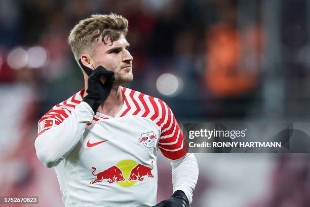 Leipzig's German forward Timo Werner celebrates scoring the first goal during the German first division Bundesliga football match between RB Leipzig...