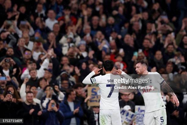 Son Heung-Min of Tottenham Hotspur celebrates with Pierre-Emile Hojbjerg after scoring the team's first goal during the Premier League match between...