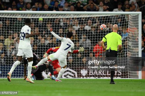 Son Heung-Min of Tottenham Hotspur scores the team's first goal during the Premier League match between Tottenham Hotspur and Fulham FC at Tottenham...