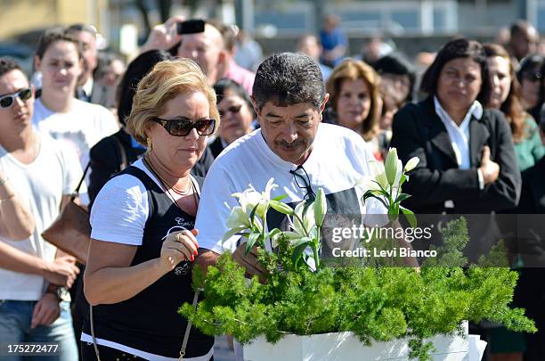 Relatives and friends make honor to victims of flight JJ3054 at the "Memorial 17 de Julho" in São Paulo Brazil, where the aircraft of TAM crashed and...