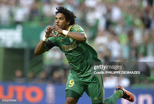 Saint-Etienne's Brazilian forward Brandao celebrates after scoring during the UEFA Europa League preliminary football match Saint-Etienne vs FC...