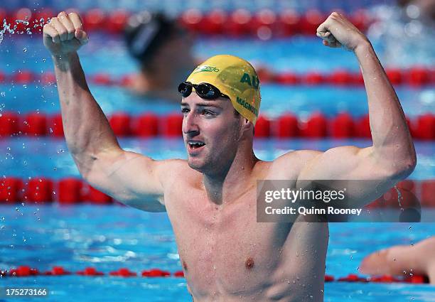 James Magnussen of Australia celebrates winning the Swimming Men's Freestyle 100m Final on day thirteen of the 15th FINA World Championships at Palau...