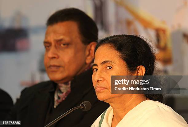 West Bengal Chief Minister Mamata Banerjee and Bollywood actor Mithun Chakraborty during a press conference after the investors summit at World Trade...