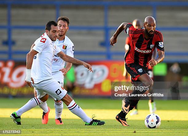 Nicolas Anelka of West Bromwich Albion battles with Lodi Francesco of Genoa during a Pre Season Friendly between West Bromwich Albion and Genoa at...
