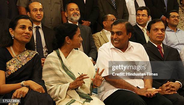 West Bengal Chief Minister Mamata Banerjee with Reliance Industry Chairman Mukesh Ambani, Chanda Kochhar of ICICI, Venugopal Dhoot of Videocon during...