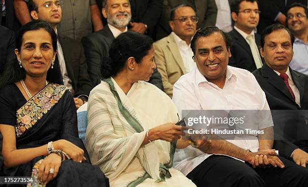 West Bengal Chief Minister Mamata Banerjee with Reliance Industry Chairman Mukesh Ambani, Chanda Kochhar of ICICI, Venugopal Dhoot of Videocon during...