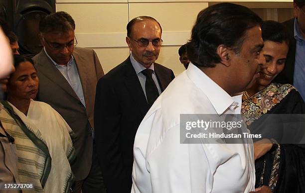 West Bengal Chief Minister Mamata Banerjee with top Indian industrialist and corporate leaders including Reliance Industry Chairman Mukesh Ambani,...