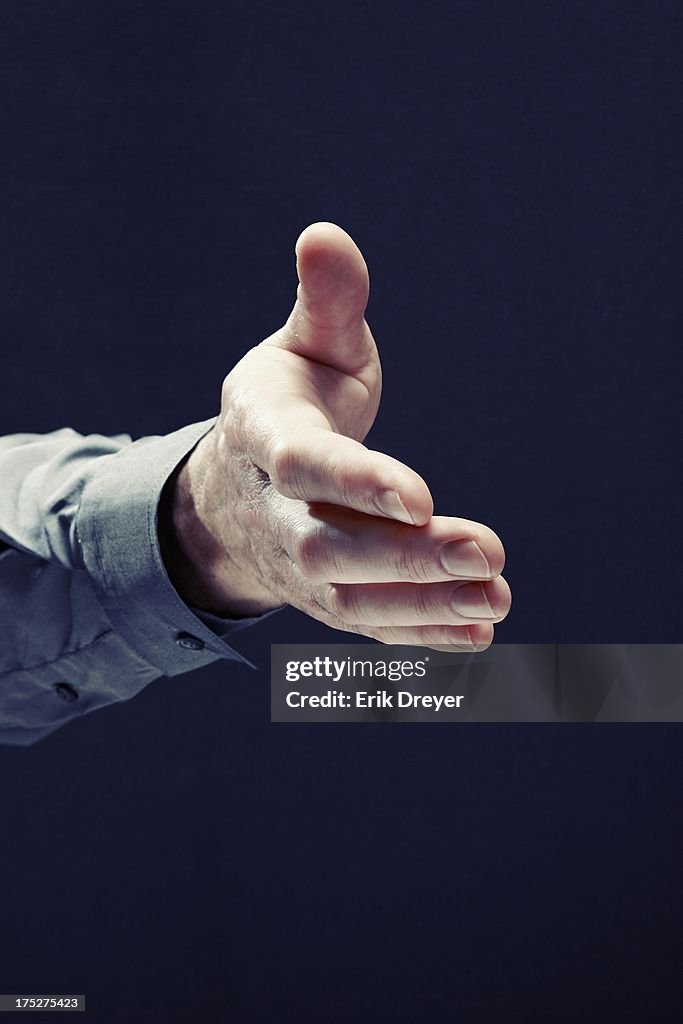 Extending Hand For Handshake High-Res Stock Photo - Getty Images