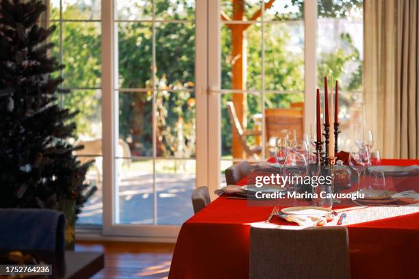 christmas table decorated for the dinner. - arrangement stock pictures, royalty-free photos & images