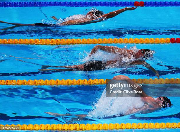 Kosuke Hagino of Japan, Ryan Lochte of USA and Tyler Clary of USA competes during the Swimming Men's 200m Backstroke semi final 2 on day thirteen of...