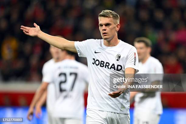 Freiburg's German defender Matthias Ginter reacts during the German first division Bundesliga football match between Bayer 04 Leverkusen and SC...