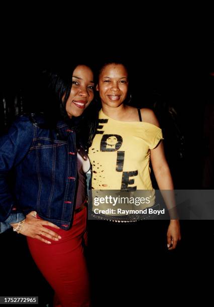 Singers Di Reed of Jade and Dawn Robinson, formerly of En Vogue and Lucy Pearl poses for photos on the red carpet during the 'Coca-Cola Nu Classic...