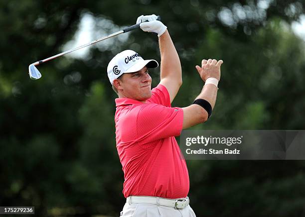 Roland Thatcher watches his tee shot on the 14th hole during the first round of the Mylan Classic at Southpointe Golf Club on August 1, 2013 in...