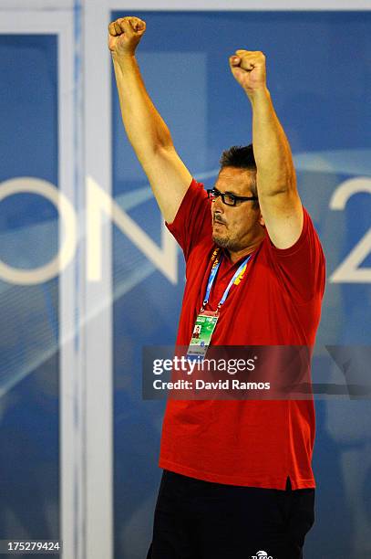 Head coach Vido Lompar of Montenegro celebrates defeating Italy during the Men's Water Polo Semi-Final round between Montenegro and Italy during day...