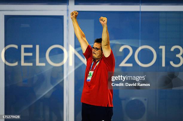 Head coach Vido Lompar of Montenegro celebrates defeating Italy during the Men's Water Polo Semi-Final round between Montenegro and Italy during day...