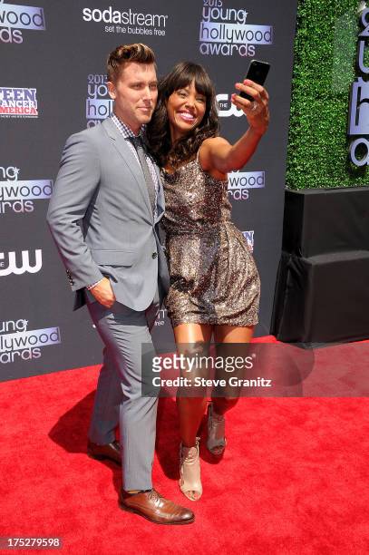 Hosts Lance Bass and Aisha Tyler attend CW Network's 2013 Young Hollywood Awards presented by Crest 3D White and SodaStream held at The Broad Stage...