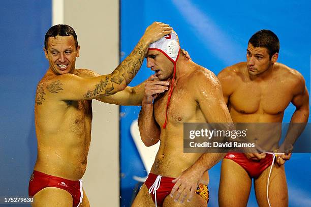 Players of Montenegro celebrate defeating Italy during the Men's Water Polo Semi-Final round between Montenegro and Italy during day thirteen of the...