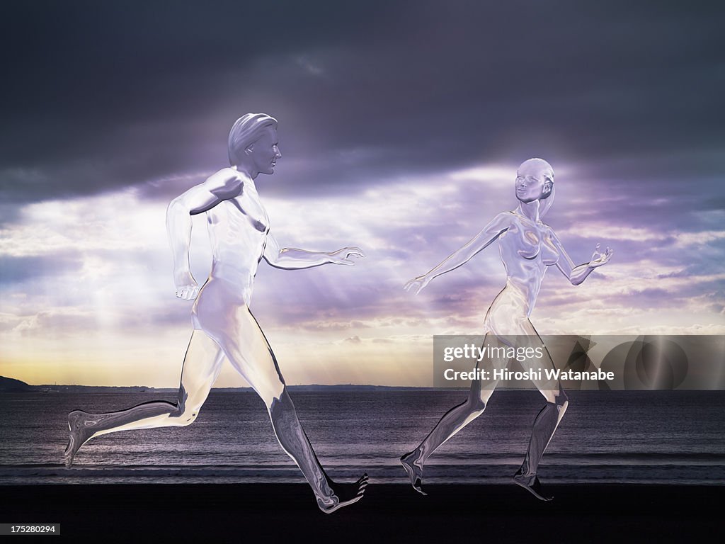 Invisible lovers running on the beach