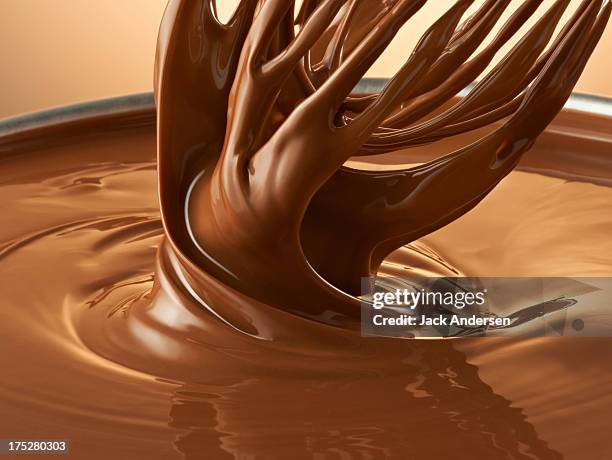 melted chocolate w/whisk - chocolate melting stock-fotos und bilder