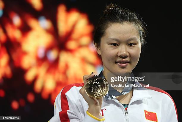 Ziege Liu of China poses with her Gold medal from the Women's 200m Butterfly Final at the Palau Sant Jordi on day thirteen of the 15th FINA World...