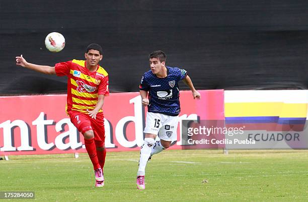 Mario Risoto of Independiente JT stuggles for yhe ball with Edwin Aguilar of Anzoategui during a match between Independiente JT and Anzoategui as...