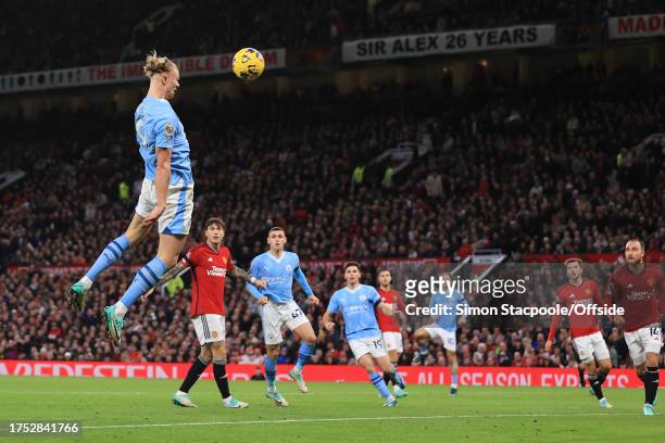 Erling Haaland of Manchester City scores their 2nd goal during the Premier League match between Manchester United and Manchester City at Old Trafford...