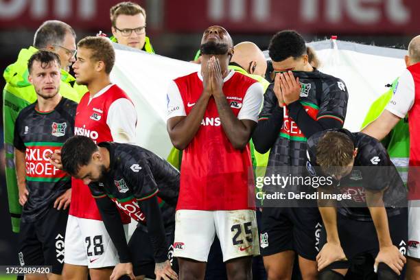 Bas Dost of NEC Nijmegen injured during the Dutch Eredivisie match between AZ Alkmaar and NEC Nijmegen at AFAS Stadion on October 29, 2023 in...