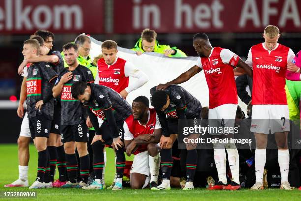 Bas Dost of NEC Nijmegen injured during the Dutch Eredivisie match between AZ Alkmaar and NEC Nijmegen at AFAS Stadion on October 29, 2023 in...