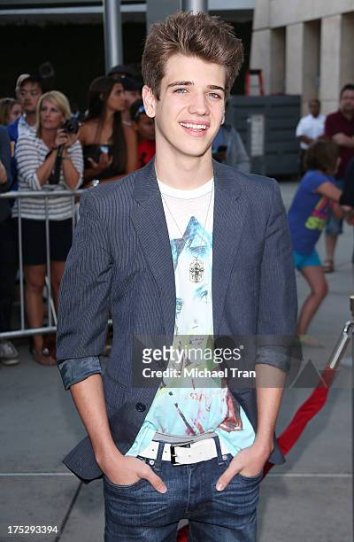 Brandon Tyler Russell arrives at a Los Angeles special screening of "I Give It A Year" held at ArcLight Hollywood on August 1, 2013 in Hollywood,...