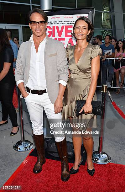 Fashion designer Lloyd Klein and actress Bahia Haifi arrive at a special Los Angeles screening of "I Give It A Year" at the ArcLight Hollywood on...