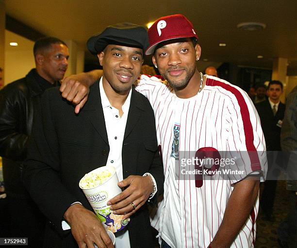 Actors Duane Martin and Will Smith pose for photos at the premiere of "Deliver Us From Eva" at the Cinerama Dome and after-party at the Sunset Room...