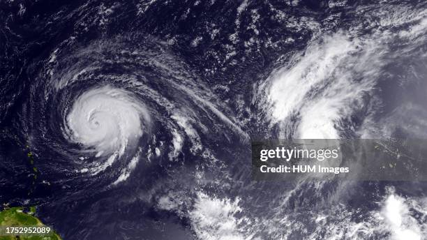 Hurricanes Igor and Julia churn in the Atlantic Ocean taking advantage of very warm sea surface temperatures to both reach category 4 strength. This...