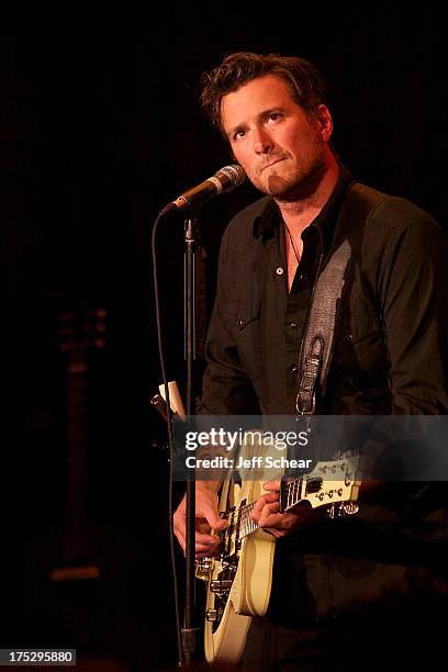 Butch Walker performs during Bud Light Music First 50/50/1 on August 1, 2013 in Chicago, Illinois.