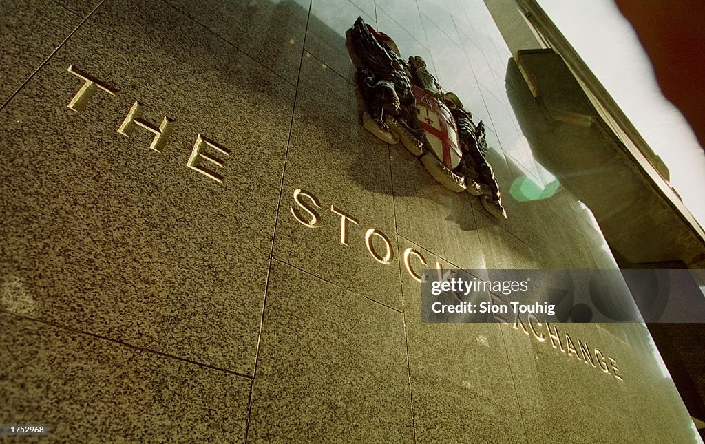A Coat of Arms is displayed on the exterior of the London Stock Exchange