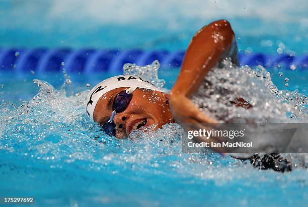 Coralie Balmy of France competes in the Women's 4x200m Freestyle Relay Final at the Palau Sant Jordi on day thirteen of the 15th FINA World...