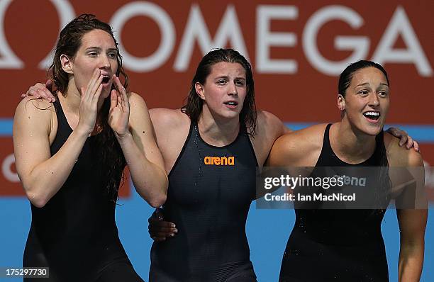 Camille Muffat, Charlotte Bonnet and Mylene Lazare look on as France take bronze in the Women's 4x200m Freestyle Relay Final at the Palau Sant Jordi...