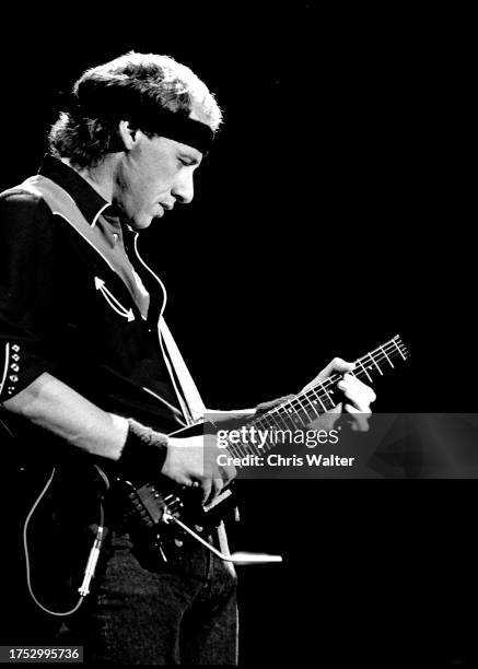 Mark Knopfler of the rock group Dire Straits performs at the Greek Theatre in Los Angeles on September 10,1985.