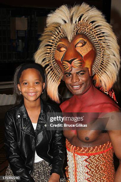 Quvenzhané Wallis and Andile Gumbi as "Simba" pose backstage at the hit musical "The Lion King" on Broadway at The Minskoff Theater on August 1, 2013...